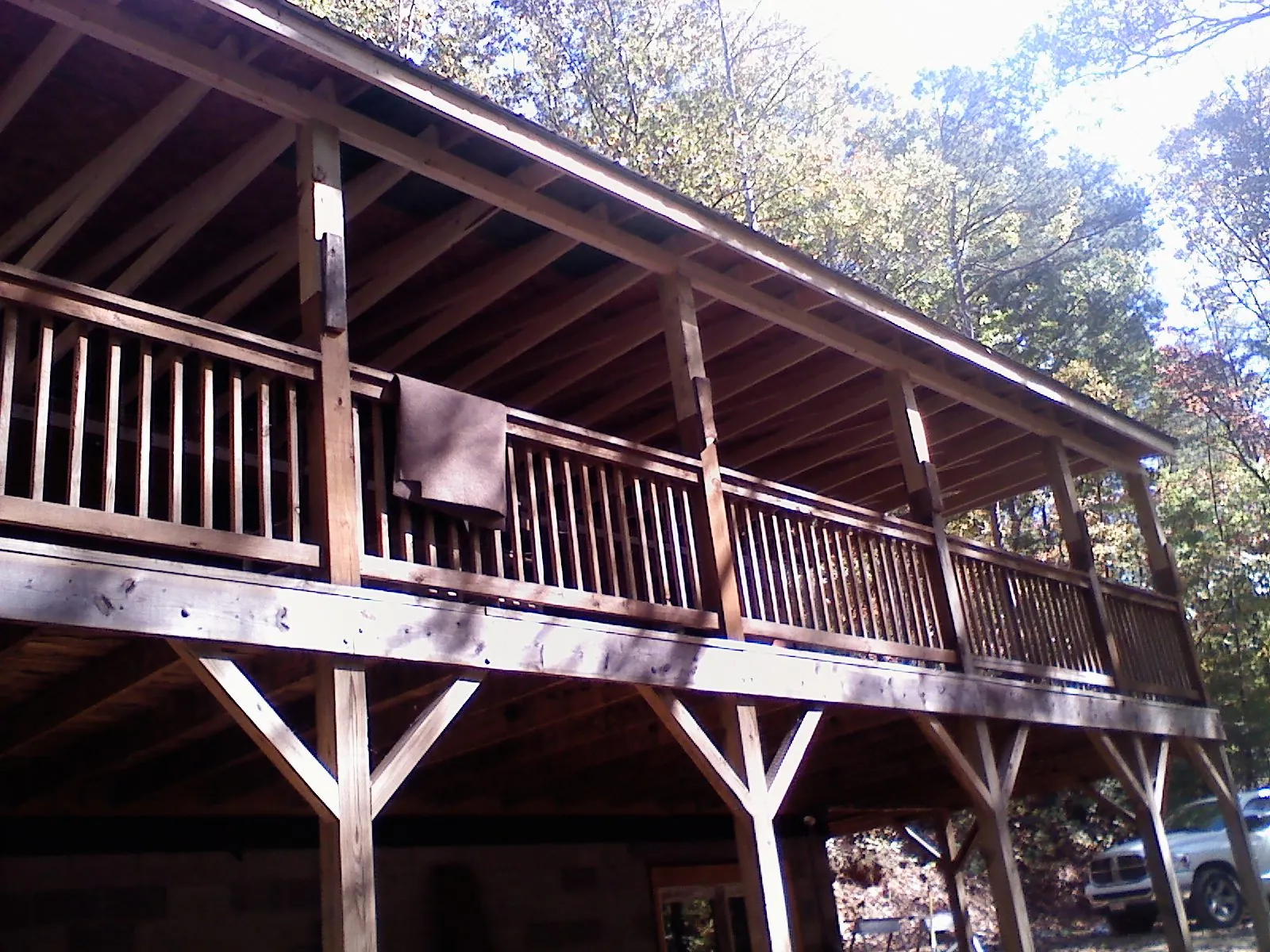Timber framing under a new elevated porch and deck — Roof Leak Repair in Barnard by Roofing Brothers